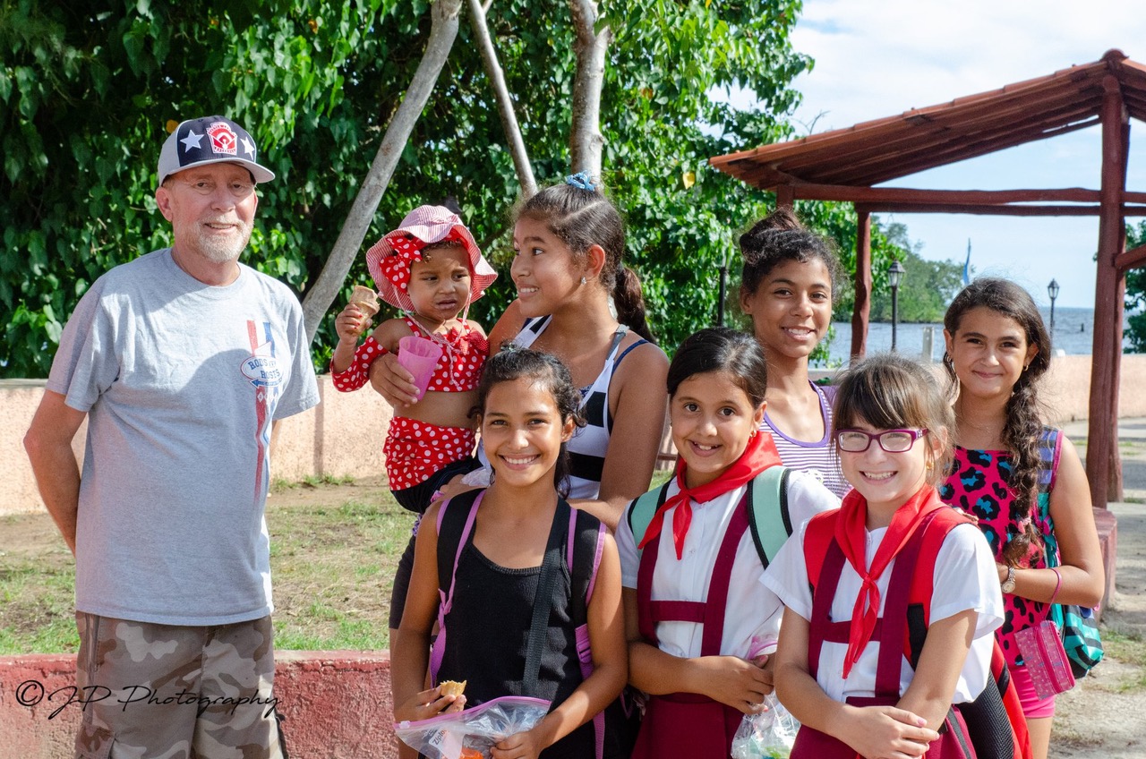 John Parsons, Senior Ambassador of Gloves for Cuba with a group of Cuban girls.
